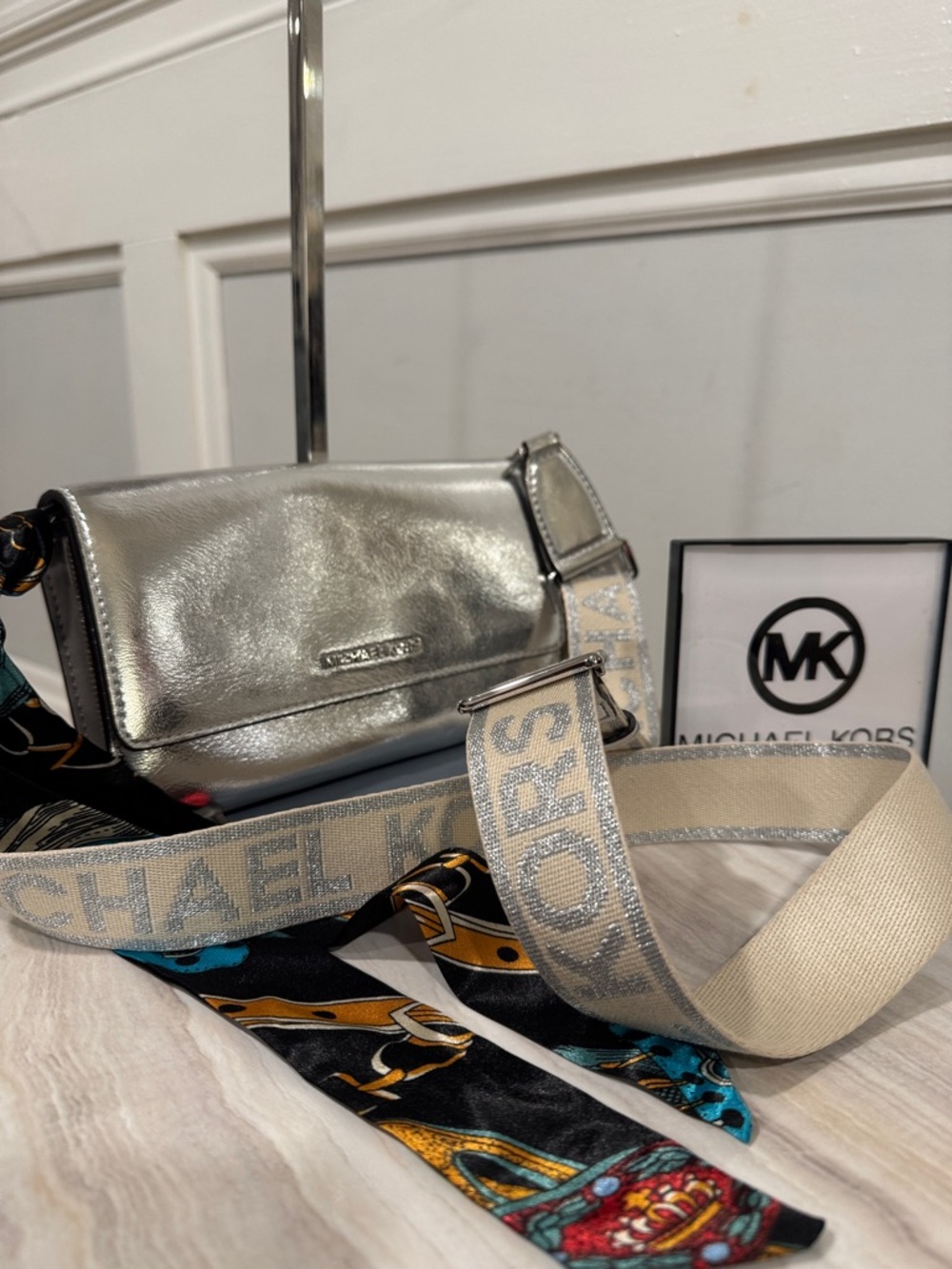 Michael Kors Jet Set Silver Metallic Leather Glitter Logo Strap Crossbody